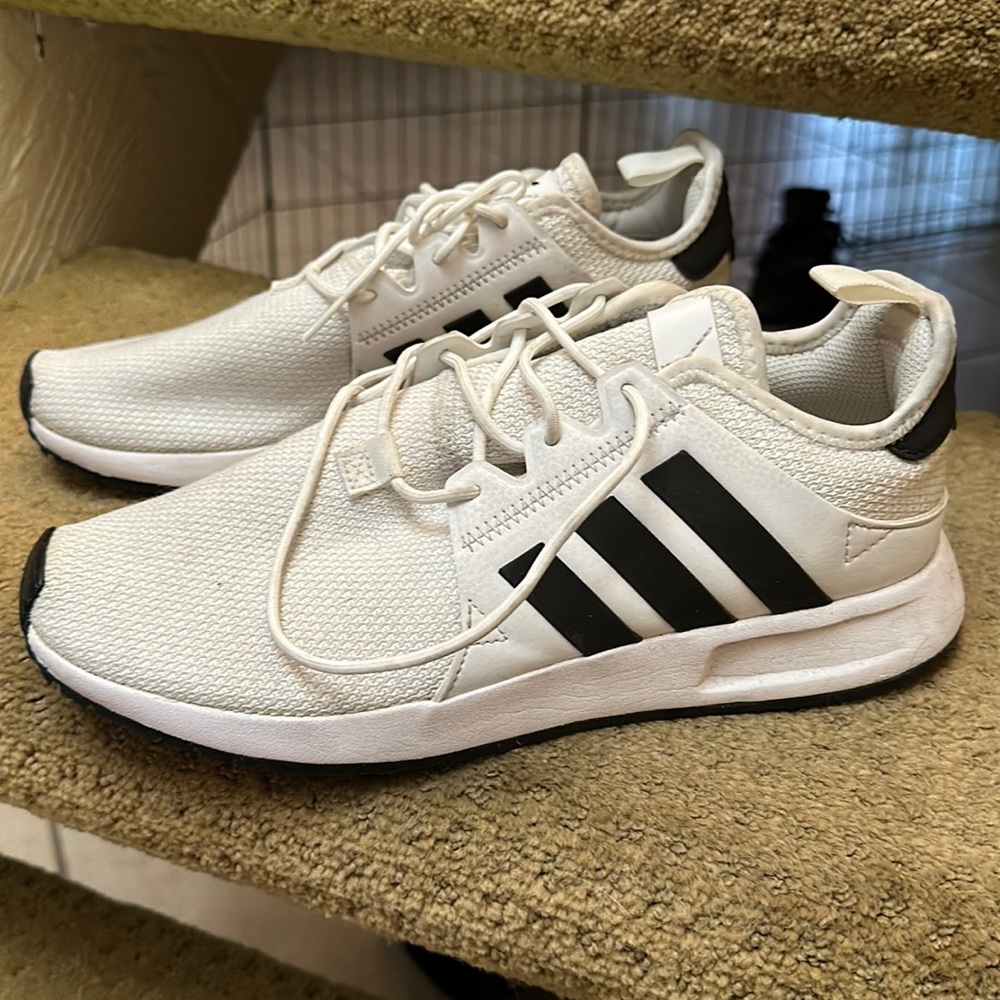 White and black adidas shoes